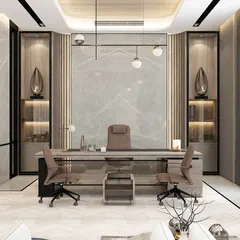 We design executive office spaces that command respect and foster productivity. This director's cabin features a balanced composition of marble, wood paneling, and ambient lighting, creating an environment of authority and refined taste for corporate leaders.