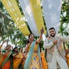 A collection of fun and vibrant moments from a sun-drenched Haldi. From playful entries to candid portraits, we capture the complete story of this joyous celebration.