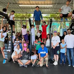 Another amazing group shot from our U.N.I.T.E. event. Kids, adults, and coaches all sharing the space and the passion for movement.