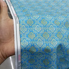 This is a high-quality 'Shahi' print kurta fabric. The material is very comfortable to wear, especially in hot weather, and the royal damask pattern in blue and gold makes for a very handsome kurta.