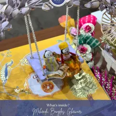 What's inside my signature Teej hamper? Everything a woman needs for the celebration: Mehendi, bangles, ghewar, and more, all packed with festive love and attention to detail.