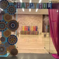 Happy Holi! We set up this vibrant entrance for a corporate office, complete with a custom "Happy Holi" arch and colourful mandala designs. We believe in creating that festive feel from the moment you walk in. 🌸