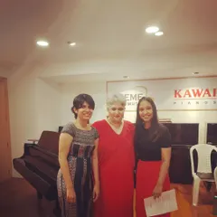 This picture is with my teacher, who helped me when I was struggling with my own voice and confidence. My coaching is built on this experience. I understand the self-doubt that can hold you back, and I create a space where it's safe to be vulnerable, to stumble, and to grow without judgment.