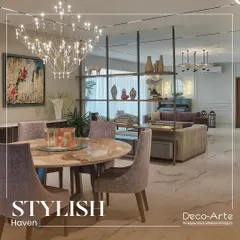 Where elegance meets comfort. This stylish haven combines a statement chandelier, a marble dining table, and plush seating to create a sophisticated open-plan living and dining space that speaks volumes about your taste.
