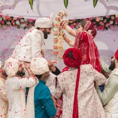 A magical Varmala ceremony where the bride is lifted up by her family to place the garland on the groom. I plan for these fun traditions to be captured perfectly.