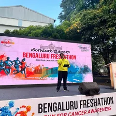 On stage at the Bengaluru Freshathon. Hosting a marathon means you have to start with high energy to motivate thousands of runners at the crack of dawn.