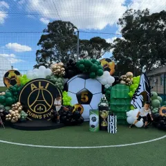 GOAL! For the little sports star in your family, we create action-packed themes like this football party. We transformed an entire field with custom backdrops, balloon arrangements, and themed props for a truly immersive experience.