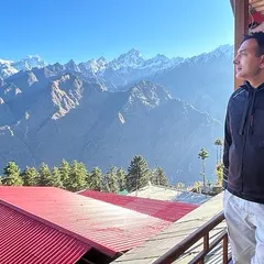 Standing on the balcony in Auli, taking in the vastness of the Himalayan range. I encourage everyone to explore the beauty of our own nation first.