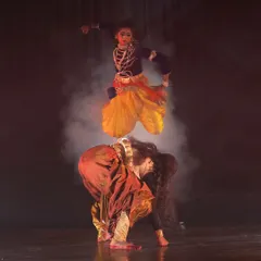 An action-packed moment capturing the dynamic energy of Krishna's tales. This leap, frozen in time, showcases the athleticism and grace of my dancers as they enact scenes of divine play and heroic feats.