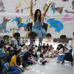The magic of storytelling in action! Here, our host captivates a room full of children and parents with the tale of the Gruffalo. Our sessions are theatrical and engaging, designed to make reading an exciting, shared experience.