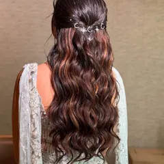 This angle shows how the celestial pins are secured within the half-up twist, ensuring they stay in place while adding a unique decorative touch.
