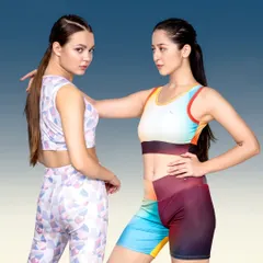 Two models in colorful, coordinated activewear sets pose together. This image is great for showcasing the variety in a collection and works well for social media campaigns or website banners.