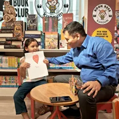 A beautiful moment between a father and daughter at our art table. We love being a place where families can connect and create together.