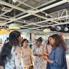 Connecting with attendees after a workshop is one of my favorite parts. Here, I am chatting with a few participants and answering their questions after my session at IKEA.