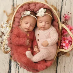 An overhead shot of the twins nestled together in a basket. Posing twins requires extra care to ensure they are both comfortable and beautifully composed.