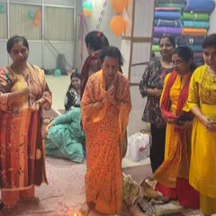 Members of our community participating in the Hawan ceremony, sharing a moment of spiritual peace and positivity.