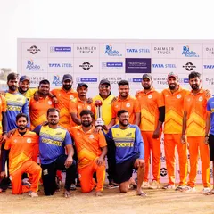The victorious team celebrates with their trophy at the Indian Corporate Cricket League, highlighting the successful culmination of a professionally organized corporate sports event.