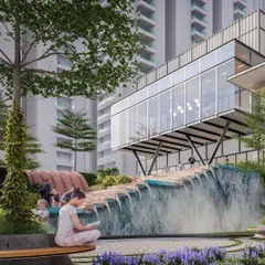 A closer look at the waterfall feature at the Myhome Vipina clubhouse. This element is not just decorative; it creates a relaxing ambiance and a unique gathering spot within the larger residential master plan.