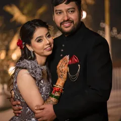 A classic posed portrait of the newly engaged couple. The soft lighting and their happy expressions make this a timeless keepsake.