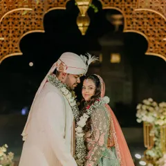 A close-up, intimate portrait of Litika and Kavish, capturing the loving gaze they share after their wedding ceremony.