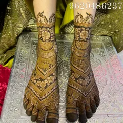Another angle of Shafin's bridal feet, showing the detail and symmetry of the design.