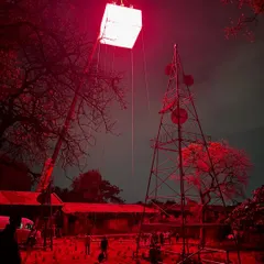 This behind-the-scenes shot from 'Kishkindhapuri' showcases our custom rigging solutions. We designed and suspended a large moonbox using Creamsource Vortex 8 lights to cast an intense, atmospheric red glow over the entire outdoor set.