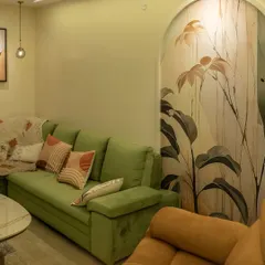 Here, a section of the botanical wallpaper is framed within a custom wall arch, treating it like a piece of fine art. This technique adds architectural interest and draws attention to the beauty of the design.