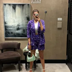 A co-ord set can easily be dressed up for a night out. This purple printed blazer and shorts set looks instantly chic with a pair of heels and a cute handbag.