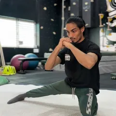 Strong hip flexors are essential for an efficient running form. This Cossack squat variation is part of our mobility routine for runners to improve stride length and reduce injury risk.