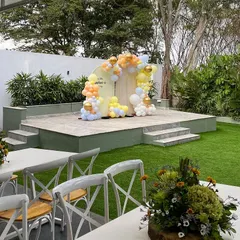 A simple and elegant setup for a Seemantham or Naming Ceremony at The Backyard. The covered dining area and open lawn provide flexible spaces for your guests to celebrate.