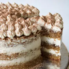 My version of the classic Tiramisu cake is completely vegan and refined sugar-free. I layer a light, coffee-soaked sponge with creamy, plant-based mascarpone and finish it with a dusting of cocoa powder for an elegant and healthy dessert.