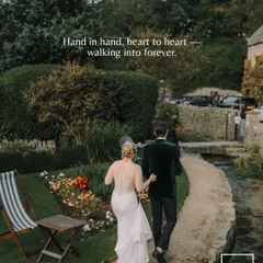 A couple walking hand-in-hand through a lush English garden, stepping into their forever. This shot captures the romantic and picturesque quality of a countryside wedding.