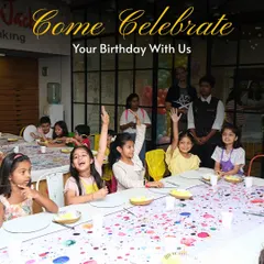 A room full of excited young artists ready to celebrate a birthday with paint and brushes. I love seeing kids so engaged and eager to start creating at my parties.