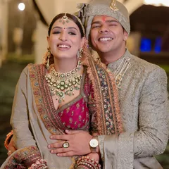 It's all about that happy couple glow. I love creating complementary looks, not matching ones. For Yashika and Sanyam, we chose a regal, multi-toned lehenga for her and a custom sage green sherwani for him, ensuring they both looked incredible together.