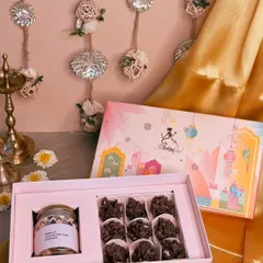 My Diwali hampers are designed to bring a sparkle to your celebrations. This beautiful box features crunchy Almond Rochers and a jar of my classic Vanilla Choco-chip Cookies, all packed in festive-themed packaging.