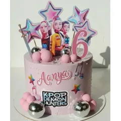 A fun K-Pop Demon Hunters cake for Aanya's 6th birthday. This chocolate strawberry cake is decorated with disco balls and stars, perfect for a little superstar.