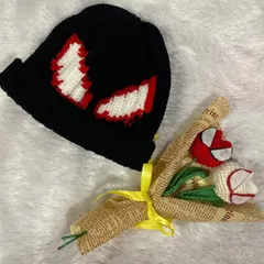 For all the Spiderman fans out there, I created this custom set. It features a handmade crochet beanie with the iconic eyes and a matching bouquet with Spiderman-themed tulips.