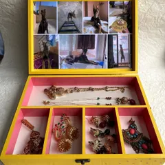 This custom jewelry box was a special wedding gift, personalized with a collage of the bride's beloved pet, Ginger. I love creating these organizer boxes because they hold not just jewelry, but precious memories too.