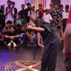 A b-girl expresses herself through movement on the dance floor. We encourage individuality and self-expression in all our battle categories.