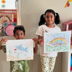 This creative duo is proudly displaying their pointillism artwork. It's so wonderful to see them accomplish a new technique with such fantastic results.