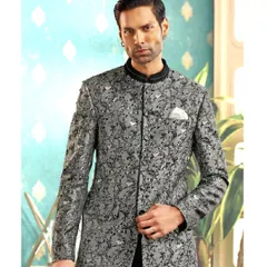 Modernity meets majesty in this textured grey bandhgala. We designed this piece with sharp, clean lines and a tailored fit, perfect for a sophisticated reception or sangeet look that commands attention with quiet confidence.