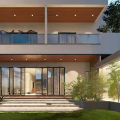This render shows the rear of "The Honest House," featuring bi-fold doors that open completely to connect the living space with the garden.