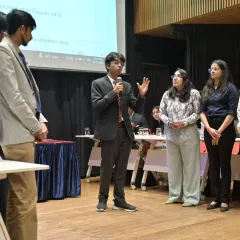 A student delegate presenting their arguments during the MUN in French. The event challenges students to use their language skills in a formal, diplomatic context.