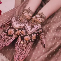 A beautiful design with a lotus pond theme. The dark-filled background makes the lotus flowers on the palm pop.