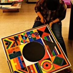 The final touches being added to a large, Raza-inspired geometric painting. It's so rewarding to see my adult students complete complex pieces they can be proud of.