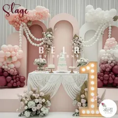 This pastel and pearl themed stage is all about elegance and sophistication. It's a perfect example of how I use a soft color palette, balloon artistry, and floral arrangements to craft a dreamy and luxurious atmosphere for milestone birthdays.