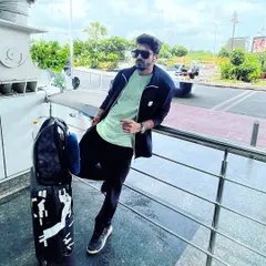 The DJ life in a nutshell: playing beats on stage and catching flights between gigs. Here I am at the airport, ready for the next show.