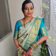 My client Mallika, looking elegant for her housewarming event. We went for a simple and subtle makeover that enhanced her natural features, paired with a classic turquoise and cream silk saree.