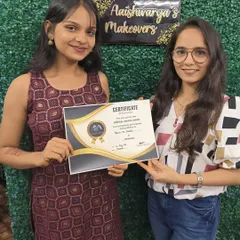 Another happy student receives her professional mehndi course certificate. She is now equipped with the skills to start her career as a mehndi artist in Thane.