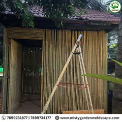 The construction of the bamboo house in progress. The walls are made from natural bamboo, providing a rustic charm and excellent ventilation.
